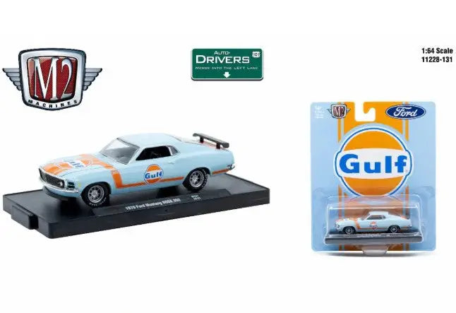 Light blue and orange Ford Mustang Boss 429 die-cast model car displayed on stand and packaging