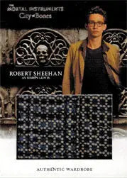 Man in glasses and dark jacket beside ornate stone carving from Mortal Instruments trading card
