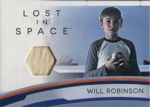 Young boy in baseball shirt holding ball beside Netflix Lost in Space Relic Card RC1