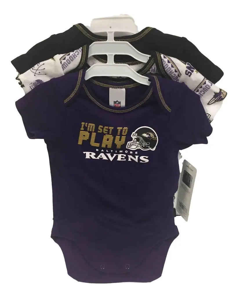 Set of three NFL Baltimore Ravens infant onesies in various colors and designs
