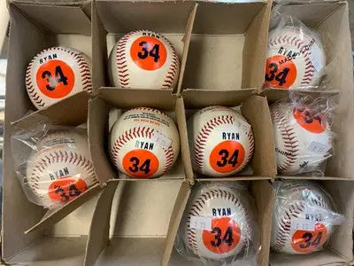 Baseballs with Ryan and 34 printed, commemorating Nolan Ryan Day September 29 1996