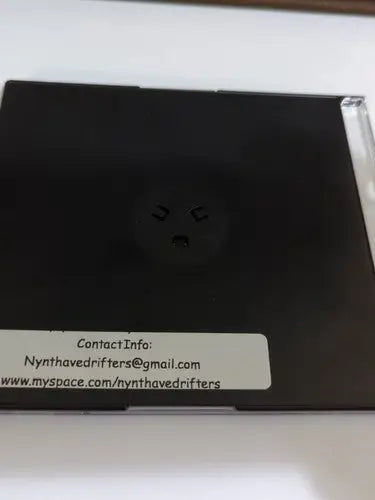 Black CD case with contact info for Nynth Ave Drifters Strawberry Road Signed album