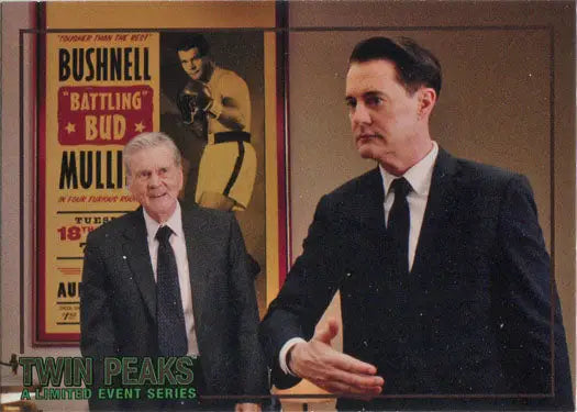 Two men in suits by boxing poster featured on Rittenhouse 2019 trading cards