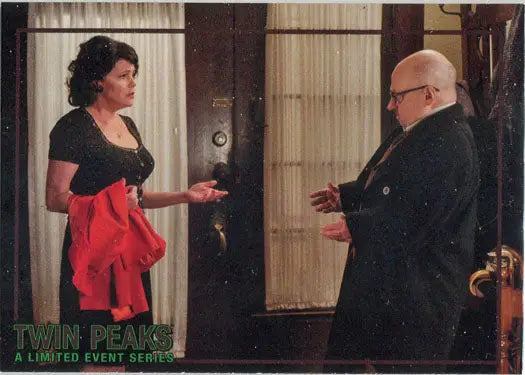 Two people discuss over Rittenhouse 2019 Twin Peaks Archives trading cards