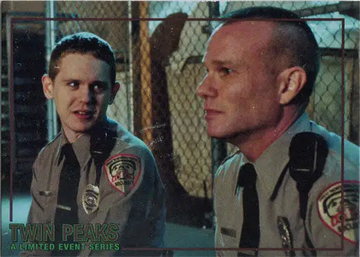 Two police officers in uniform for Rittenhouse 2019 trading cards featuring Hurley & Sykes