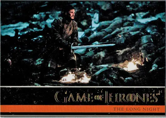 Man in dark clothing with a sword in snowy battle from Thrones Season trading cards