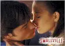 Close-up of two people kissing on Smallville Season 5 internet exclusive promo card