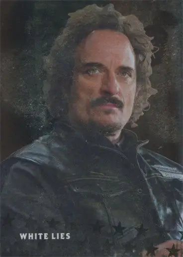 Middle-aged man with curly hair in dark jacket on Sons of Anarchy trading card