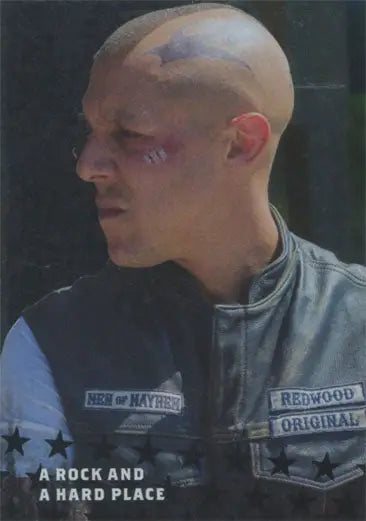 Bald man with facial tattoos in leather vest on Sons of Anarchy trading card design