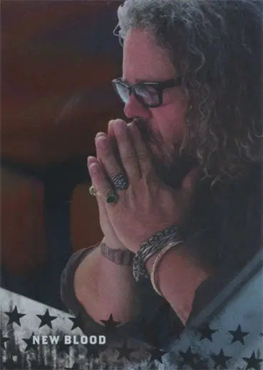 Person with curly hair and glasses poses near face, featured on Sons of Anarchy trading card