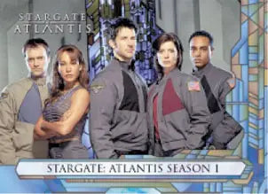 Promotional photo of Stargate Atlantis cast featured on a themed promo card for trading cards