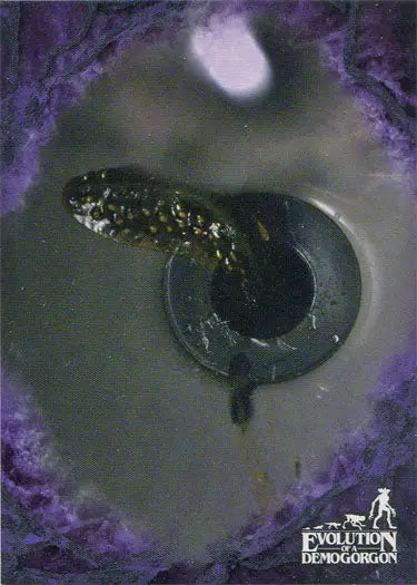 Tadpole with eye and tail in murky water on Stranger Things Purple Parallel Chase Card