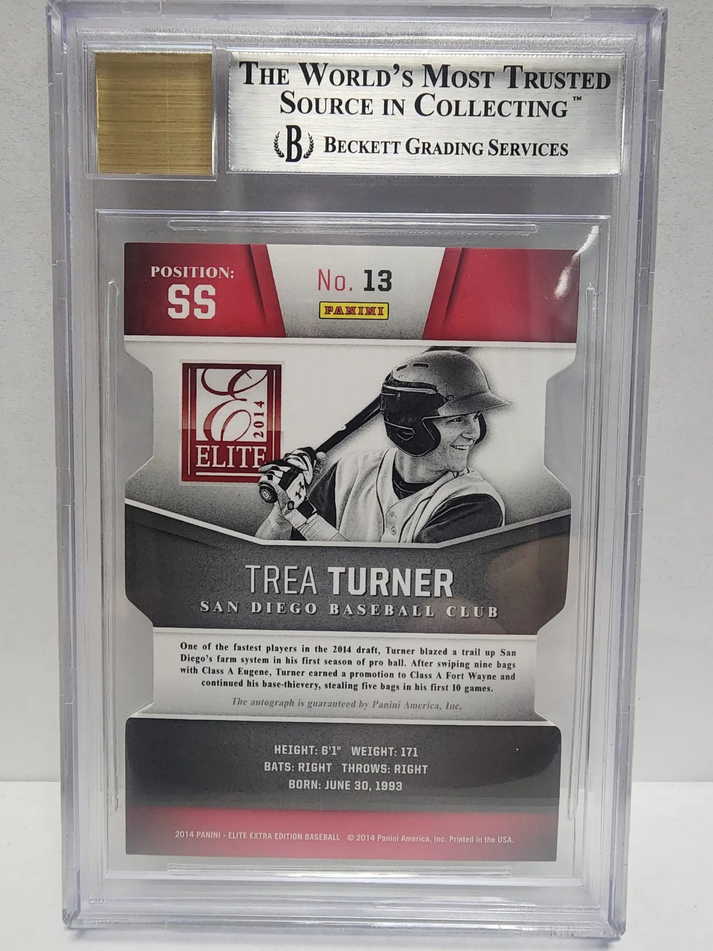 A graded Trea Turner baseball card from Elite Extra Edition Gold Auto series
