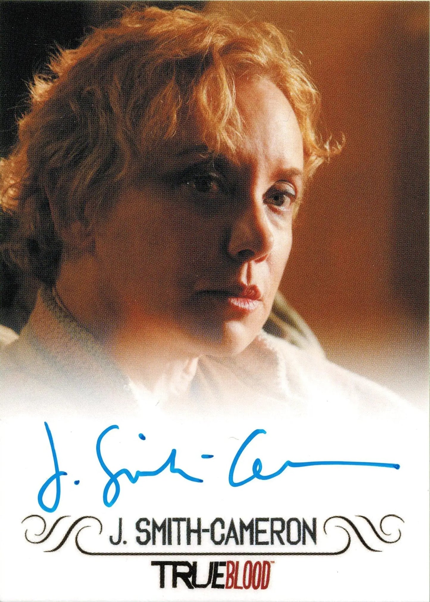 Autographed trading card of Melinda Mickens by J. Smith-Cameron with curly blonde hair