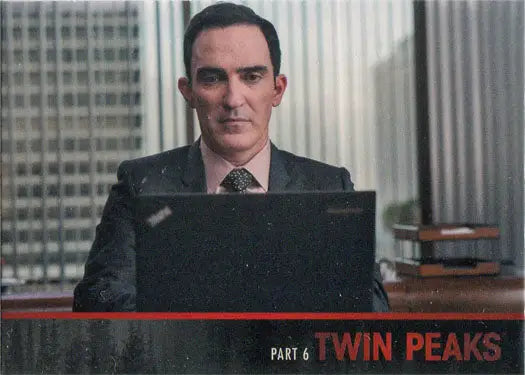 Serious man in a dark suit with cityscape, Twin Peaks Limited Series Event Card L17