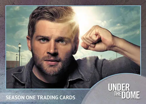 Close-up of a bearded man with raised fist on Under the Dome P2 promo card trading card