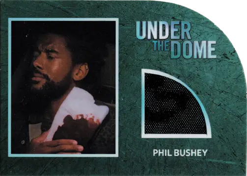 Trading card showcases Under the Dome relic costume card featuring Nicholas Strong as Phil Bushey