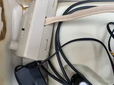 Beige home video game console with cords for Vintage Odyssey 400 Magnavox system