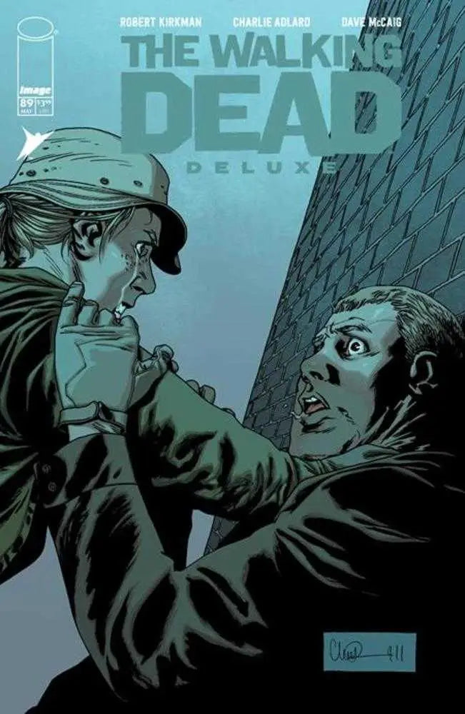Walking Dead Deluxe #89 Cover B features characters in tense confrontation, perfect for collectors