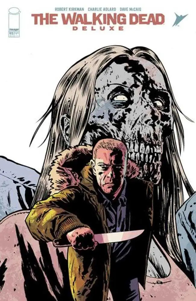 Walking Dead Deluxe #95 Cover C showcases a dramatic zombie horror scene