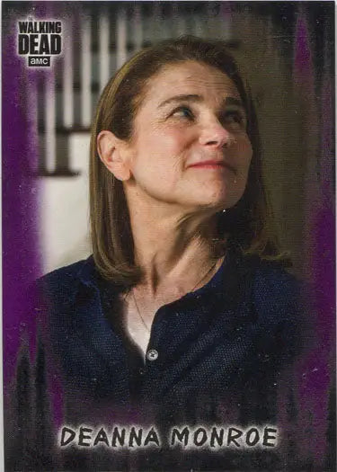Middle-aged woman smiling in purple parallel card featuring The Walking Dead theme