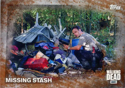 Man rummaging through supplies outdoors on Walking Dead Season 5 Rust Parallel Base card
