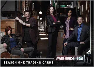 Group of five people posing for Warehouse 13 promo card in a television show setting