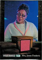 Person in glasses and sweater holding a pink book for Warehouse 13 trading cards