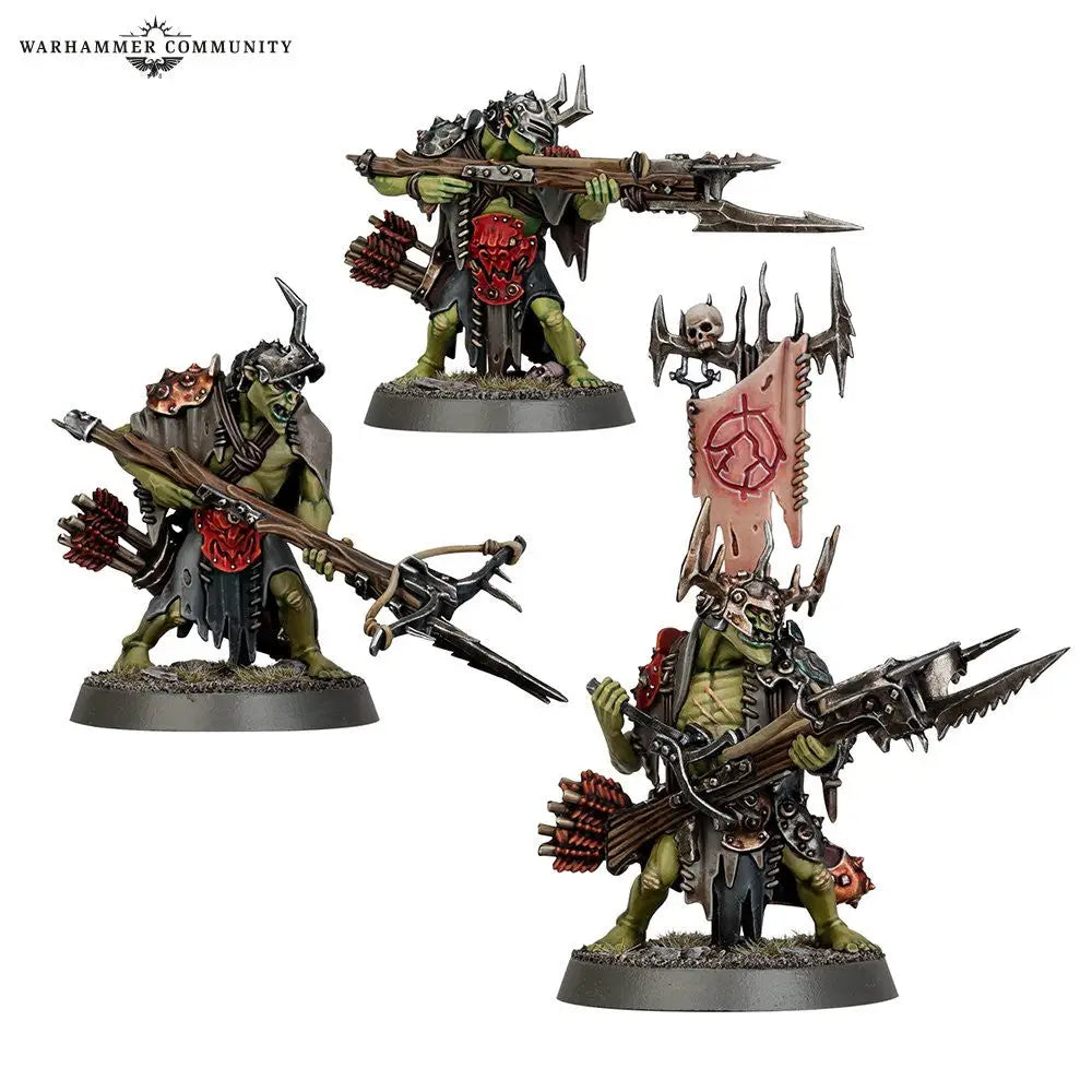Three armored Orruk Warclans warriors with red symbols in Warhammer product image