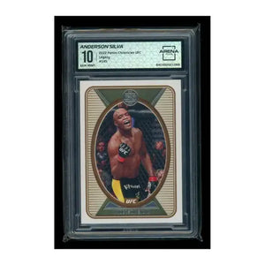 A 2022 panini chronicles ufc legacy trading card featuring anderson silva in a gold and black oval design, graded 10 by arena.
