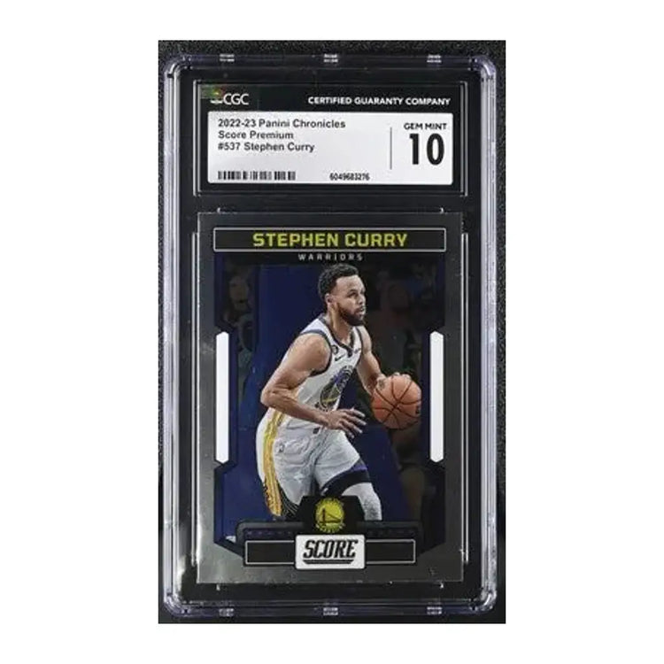 A 2022-23 panini chronicles score premium basketball trading card featuring stephen curry in his golden state warriors uniform, encased in a cgc-certified protective slab with a gem mint 10 rating.