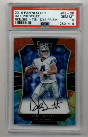 This is a 2016 panini select dak prescott rookie signature card, featuring the dallas cowboys quarterback in his white jersey with blue accents and silver helmet, encased in a protective psa grading slab.