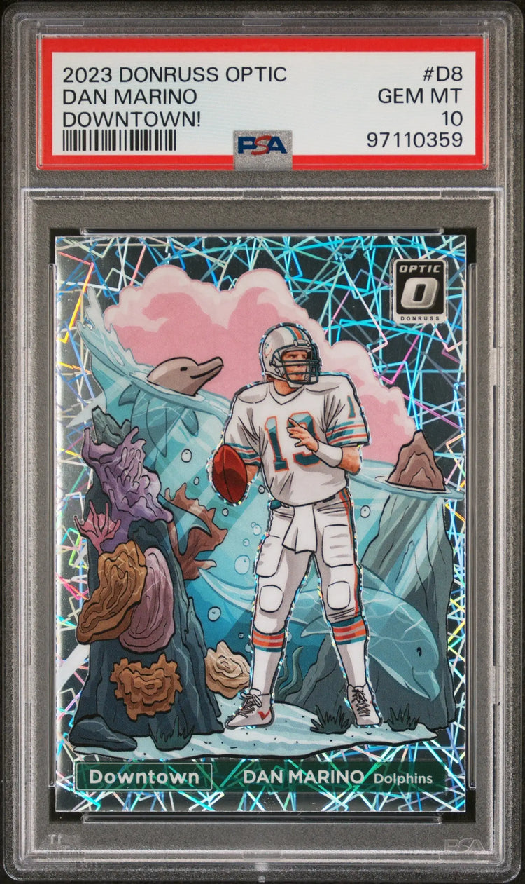 2023 donruss optic #d8 dan marino downtown! Football trading card featuring a holographic, iridescent design with vibrant blue and pink hues.