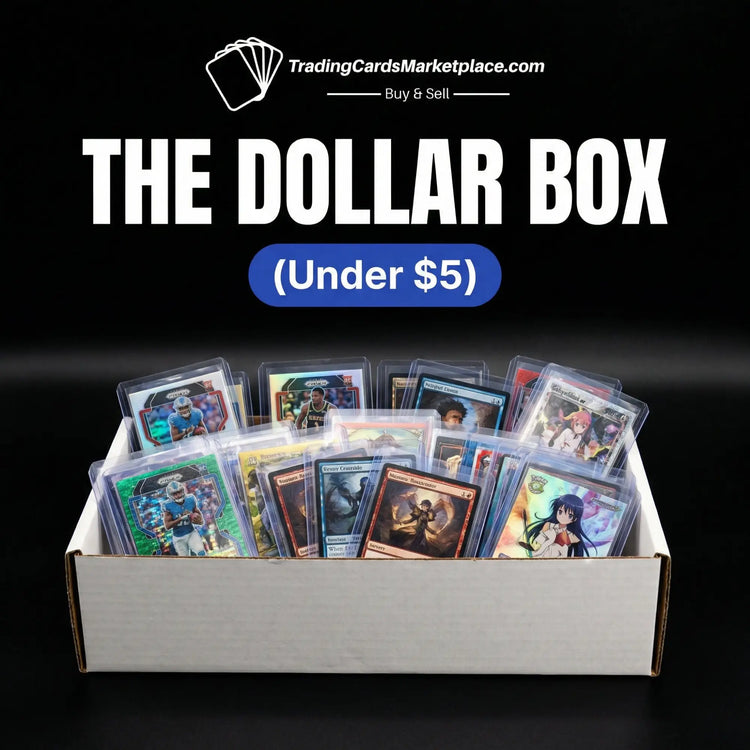 White cardboard box filled with assorted trading cards in clear protective sleeves.