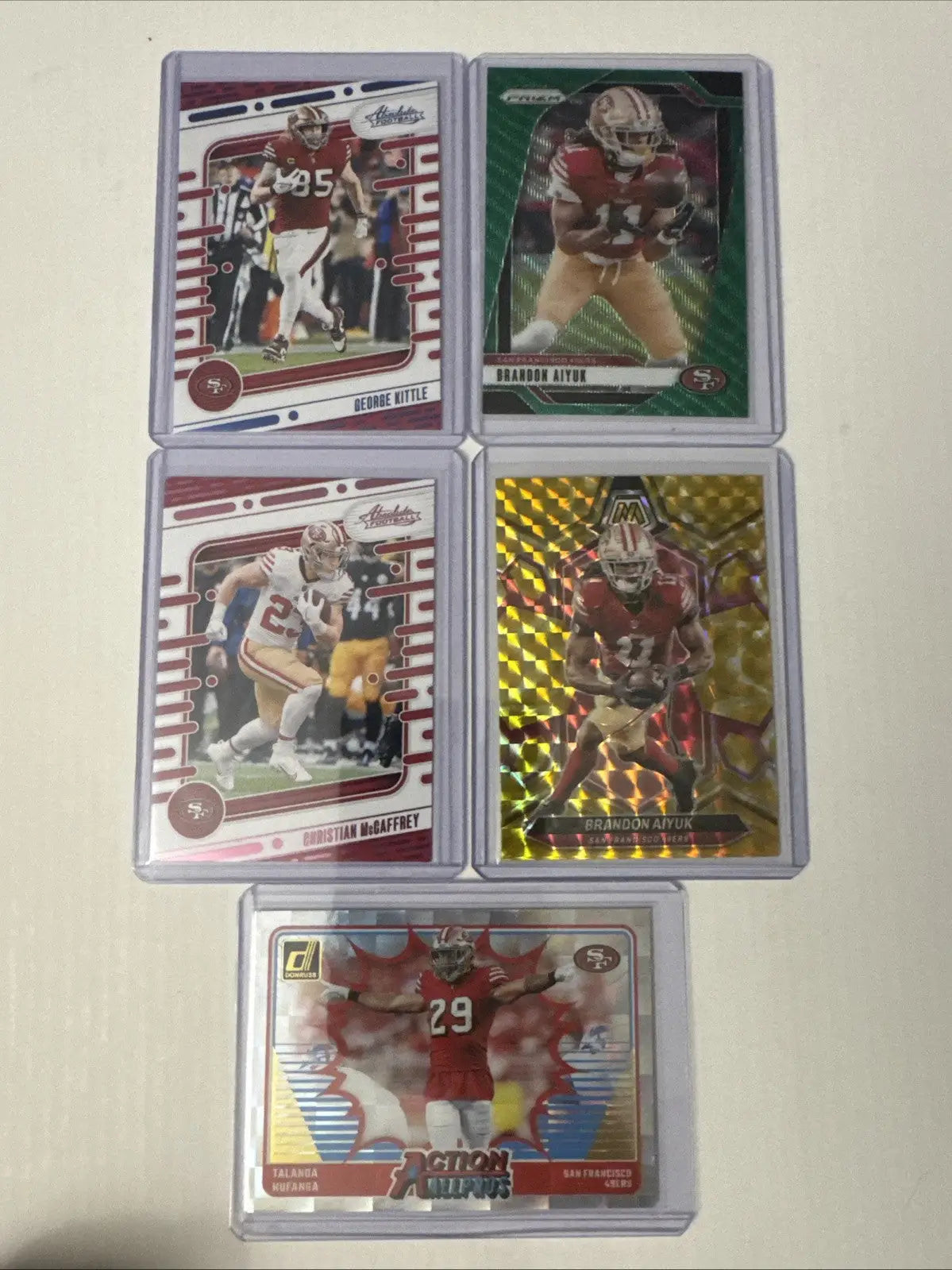 Collection of five San Francisco 49ers football trading cards in a card lot