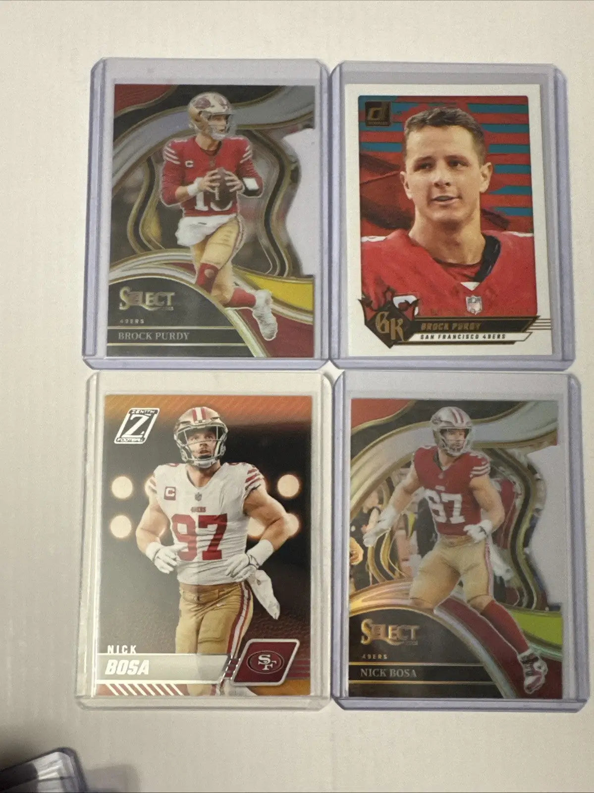 San Francisco football trading card lot featuring 49ers players in protective cases