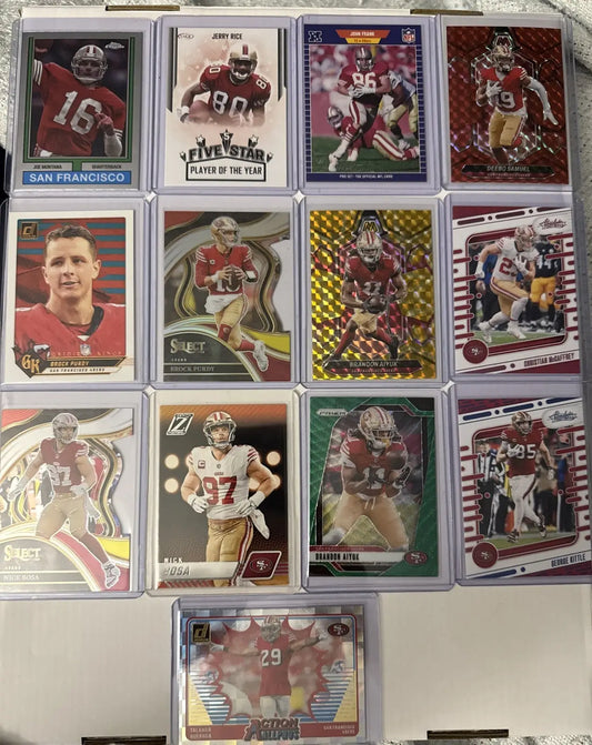 San Francisco football trading card lot featuring 49ers players including Purdy and Montana