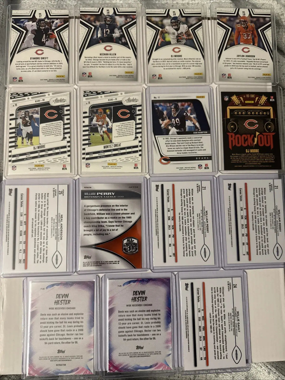 Chicago Bears football trading cards featuring William Perry Devin Hester in protective sleeves