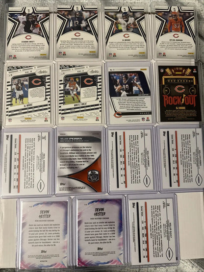 Chicago Bears football trading cards featuring William Perry Devin Hester in protective sleeves