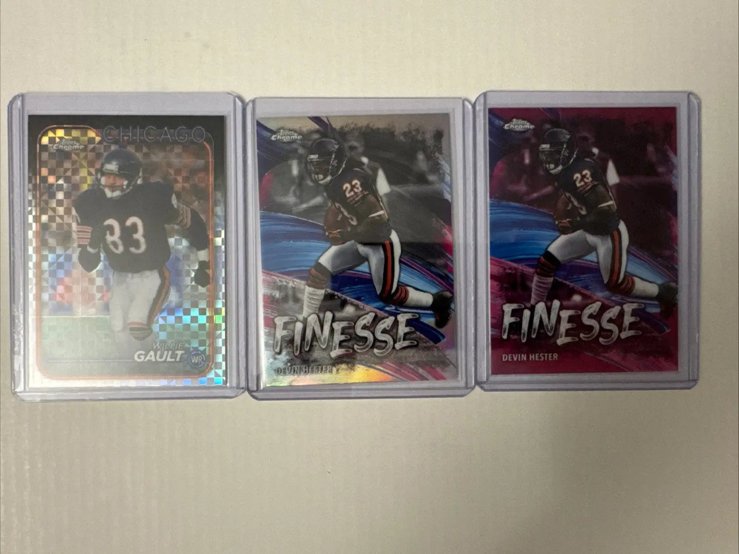 Chicago Bears football trading cards featuring William Perry Devin Hester in protective cases