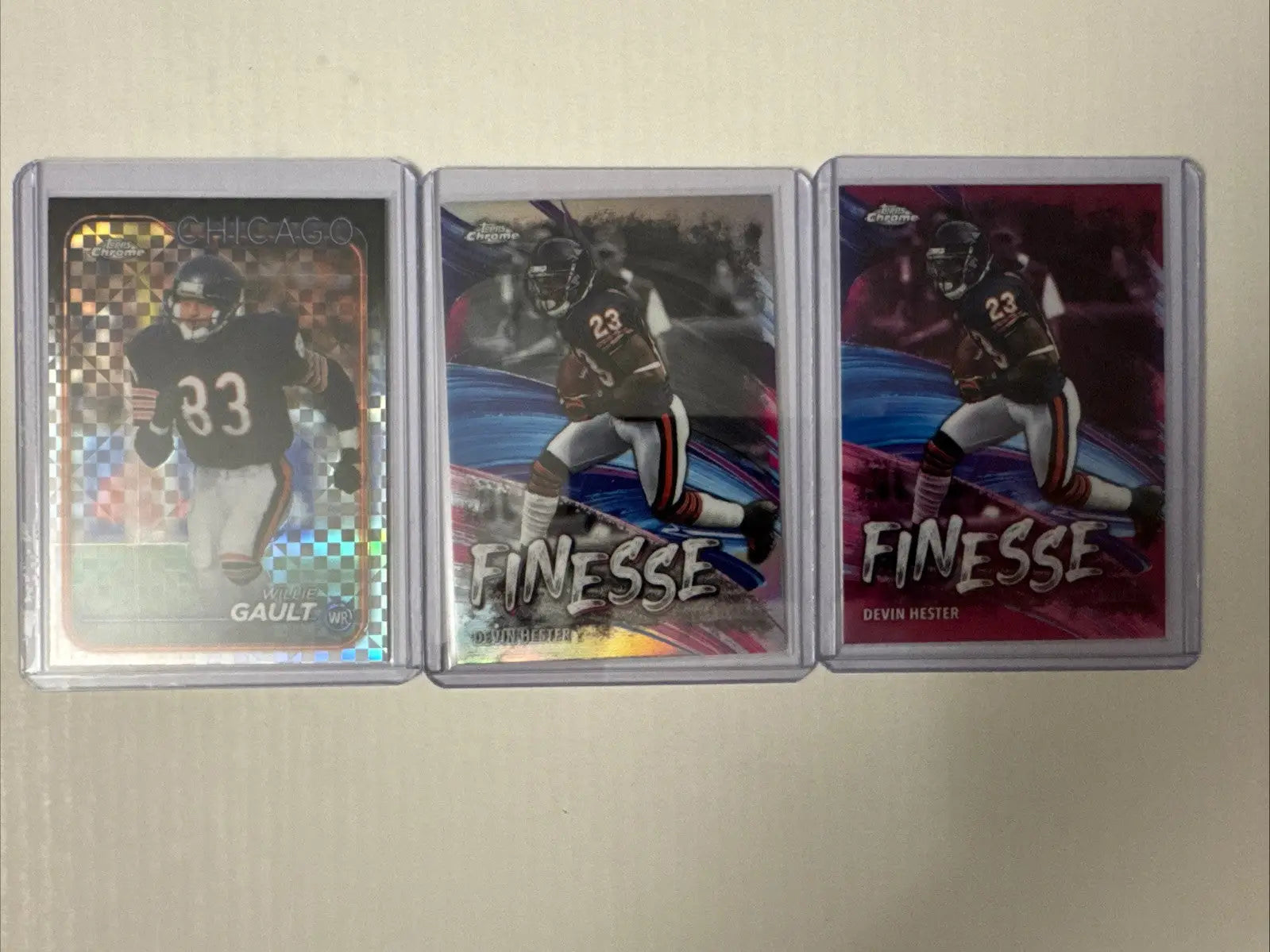 Chicago Bears football trading cards featuring William Perry Devin Hester in protective cases