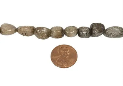 Polished gray gemstone beads from Ice Flake Quartz Grey Nuggets strand