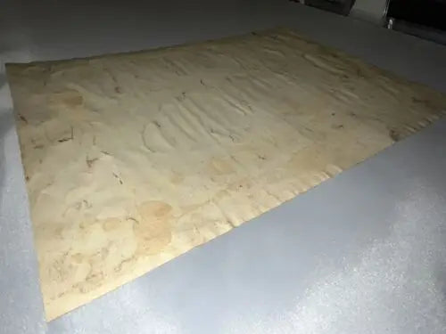 Wrinkled and aged paper featuring FEG Murray art from 1945 Seein Stars artwork