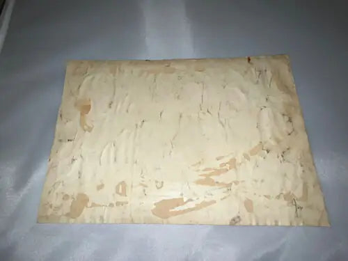 Damaged and stained paper from 1945 FEG Murray art featuring Laurel Hardy and Errol Flynn