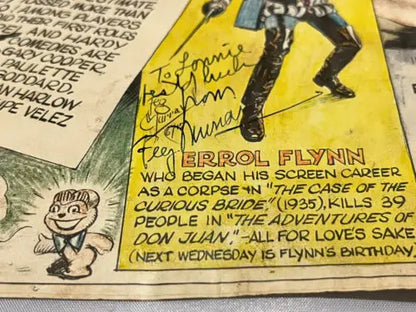 Signed Errol Flynn advertisement from 1945 FEG Murray art featuring classic film stars