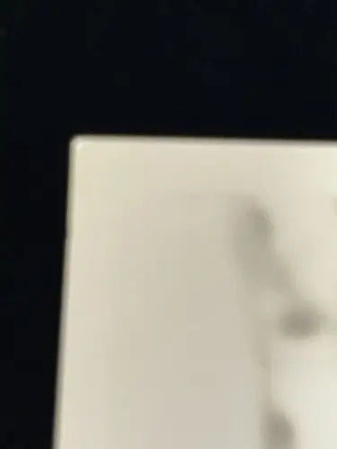 Blurred white surface of 1946 Jane Powell signed Hollywood photo for trading cards