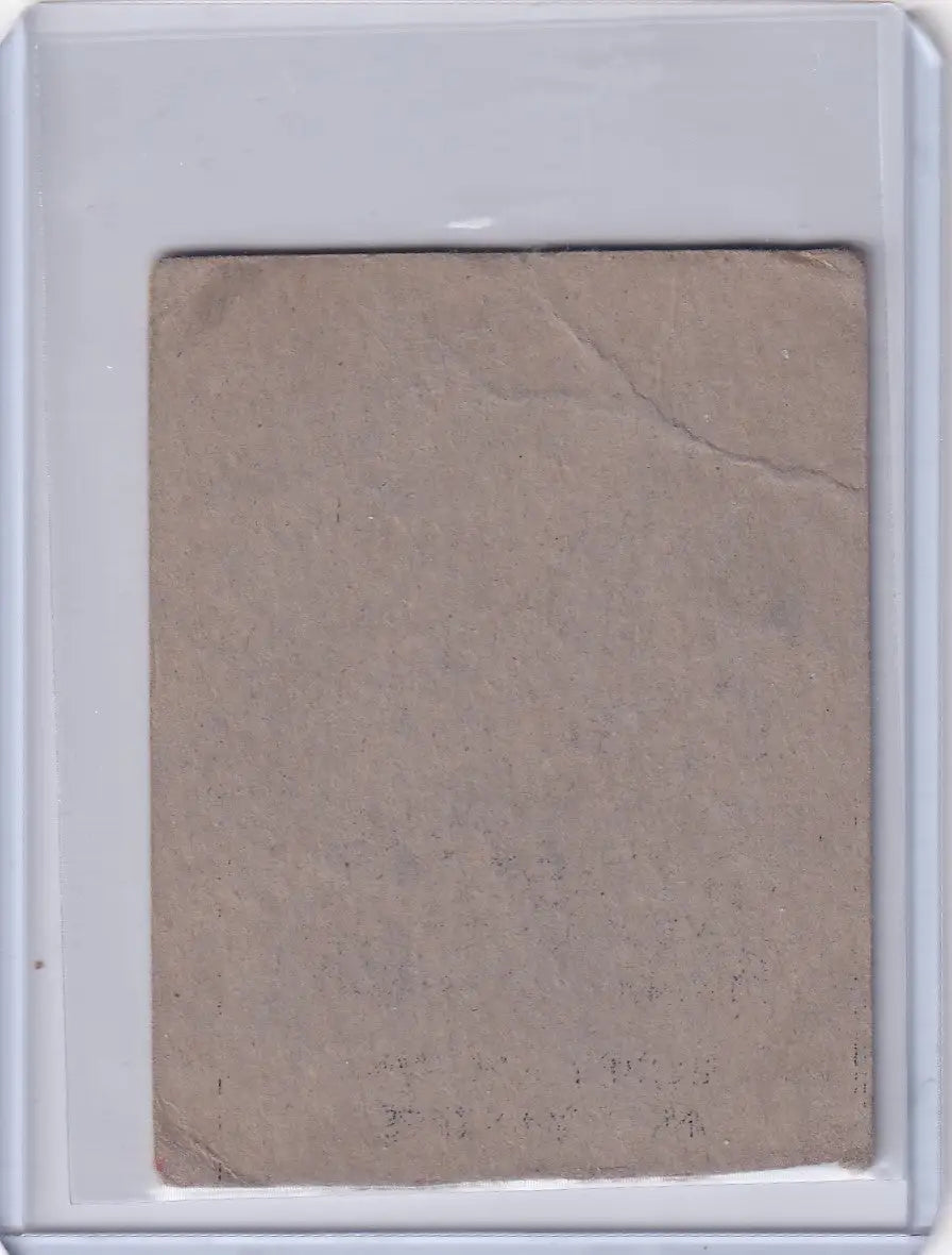Worn tan card in plastic case featuring 1948 R346 Blue Tint #9 Bobby Brown New York Yankees
