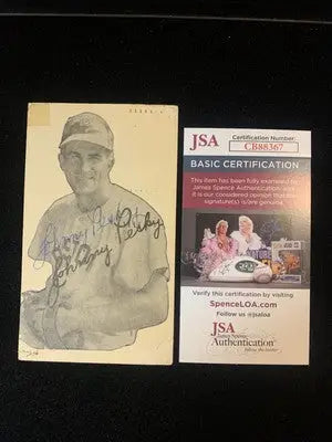 Signed Johnny Pesky baseball card with authentication, featuring dated postmarked postcard
