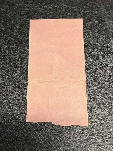 Rectangular pink paper ticket stub from the 1952 Dallas Eagles Baseball Club Texas League