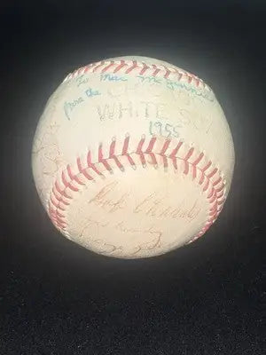 Autographed Chicago White Sox baseball with red stitching featuring Nellie Fox Kell Minoso